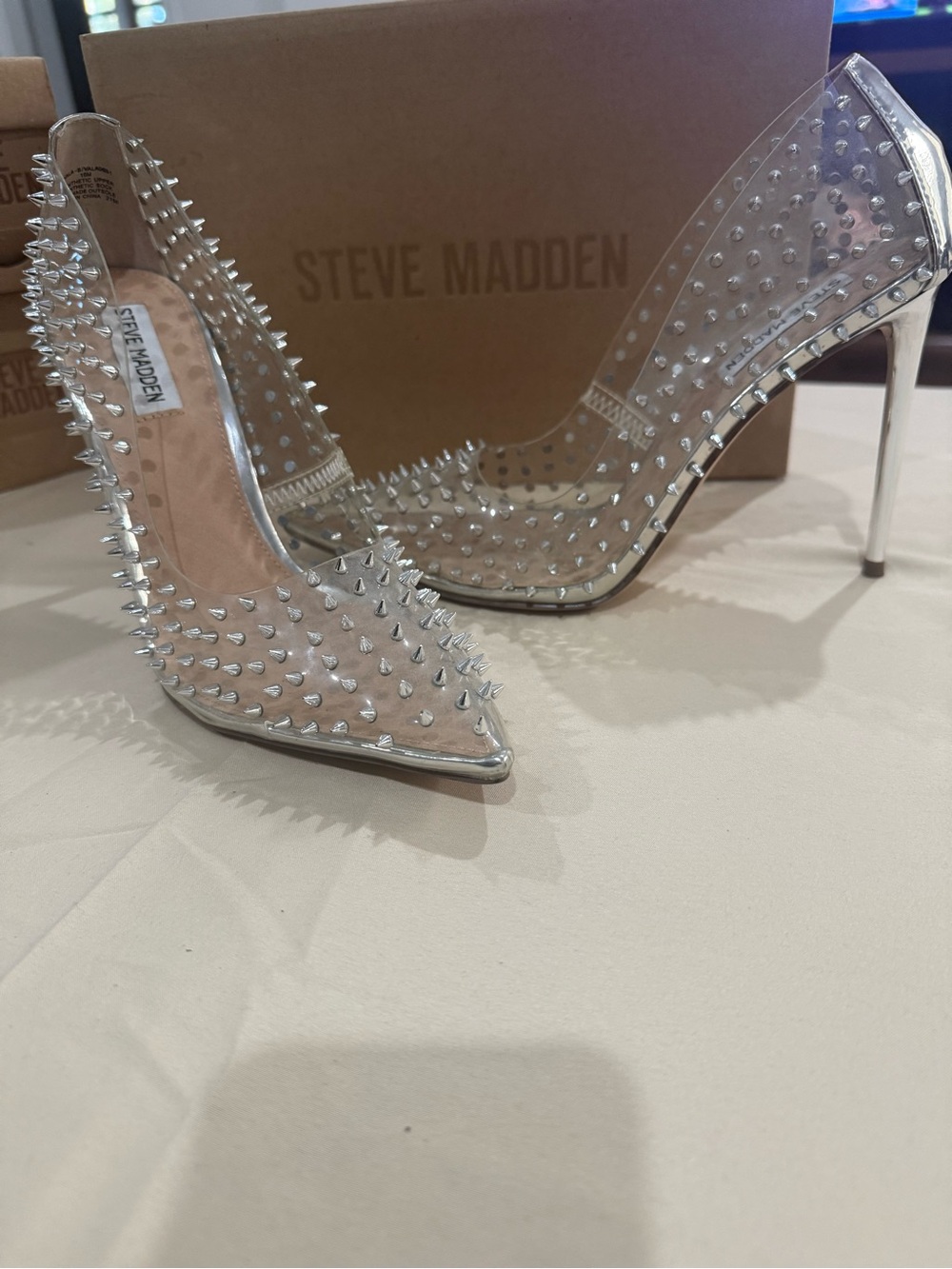 Steve Madden Clear Pointed-Toe Stiletto Heels with Silver Spikes
